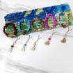 تصویر  دستبند به همراه گیره روسری طرح های فاطمه زهرا (س)/ آبرنگی
